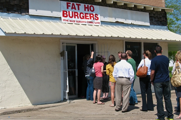 Burger-craving patrons waited in a long line to taste Fat Ho Burgers during the restaurant&#039;s first week in business.
